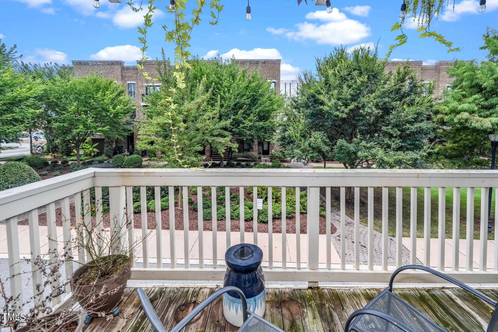 501 North Person Street, Unit 107 Raleigh, NC 27601 - Photo 25 of 30 a view of a chair in a balcony