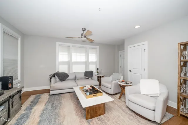 a living room with furniture and a couch