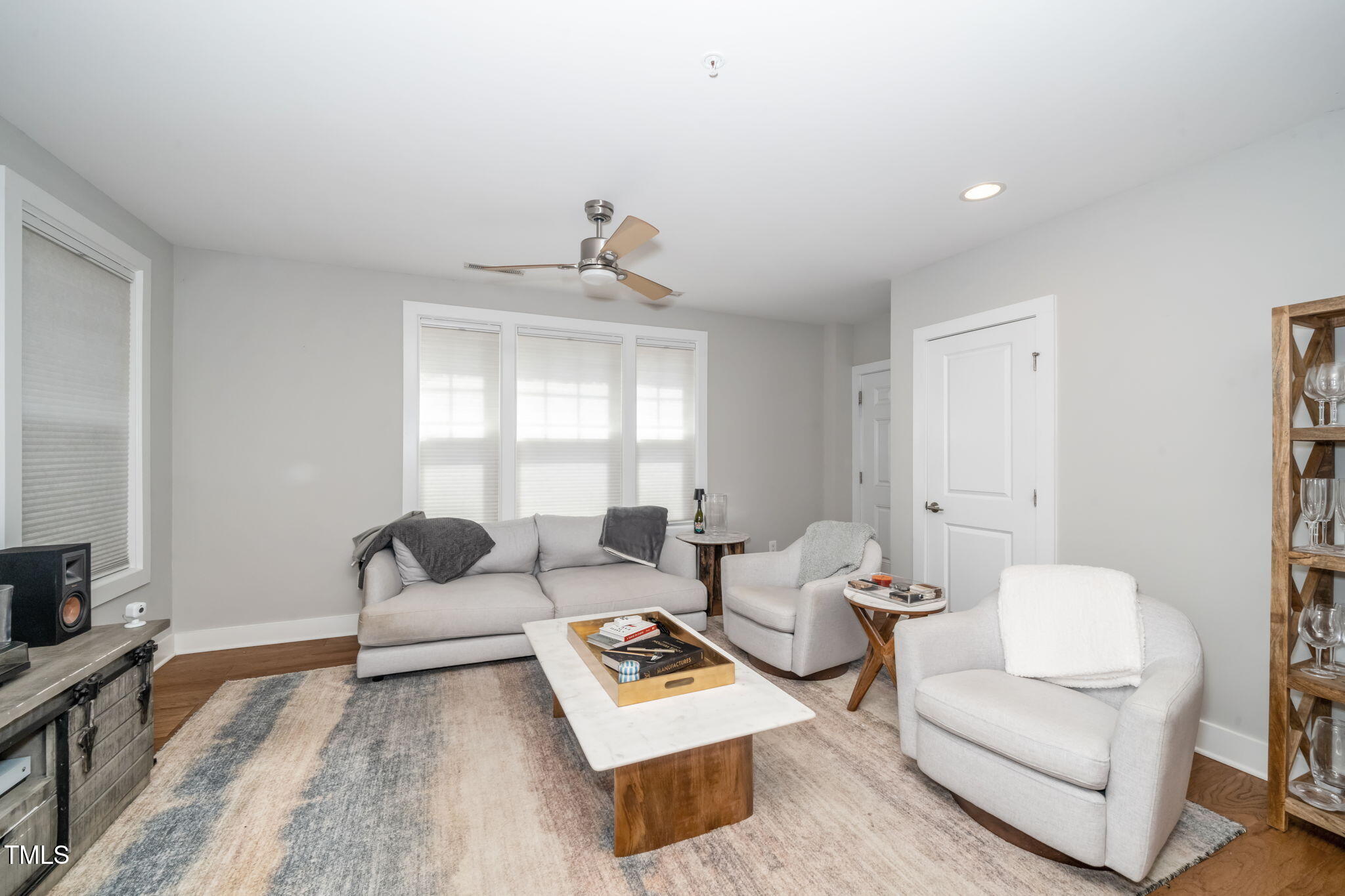 501 North Person Street, Unit 107 Raleigh, NC 27601 - Photo 7 of 30 a living room with furniture and a couch