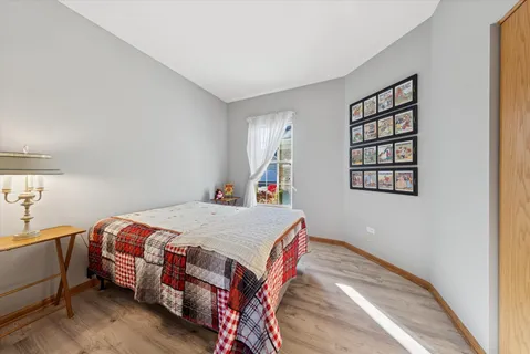 a bedroom with a bed and a closet