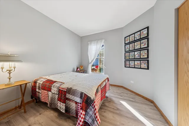 a bedroom with a bed and a closet