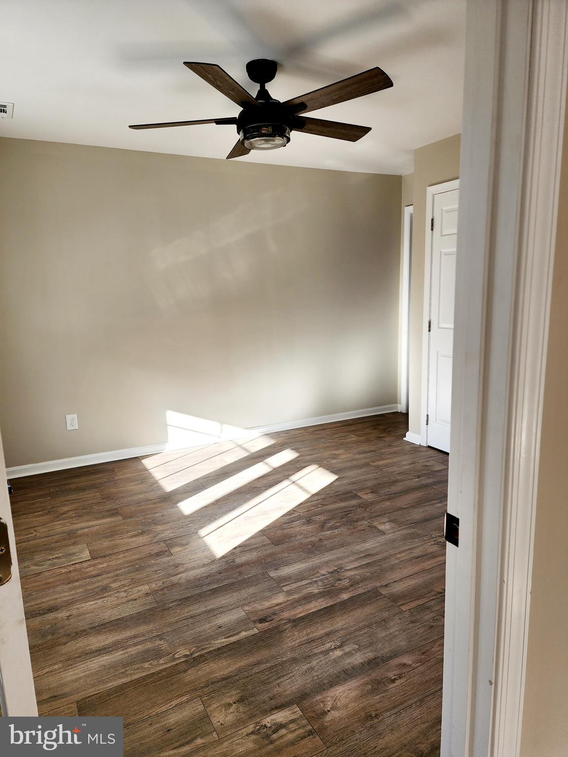 475 Bafford Road Lusby, MD 20657 - Photo 14 of 21 a view of empty room with wooden floor