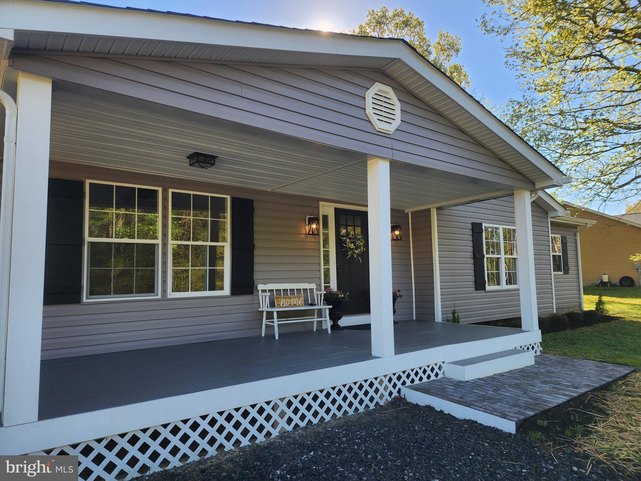 475 Bafford Road Lusby, MD 20657 - Photo 4 of 21 a front view of a house with a porch