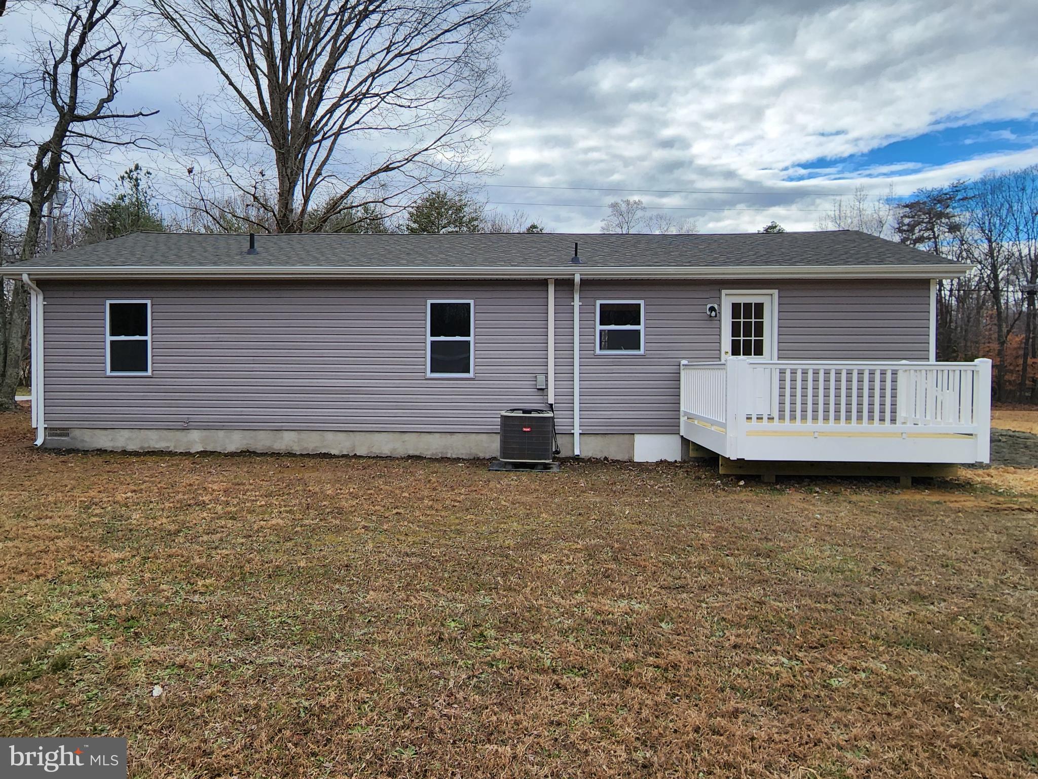 475 Bafford Road Lusby, MD 20657 - Photo 5 of 21 a front view of a house with garden