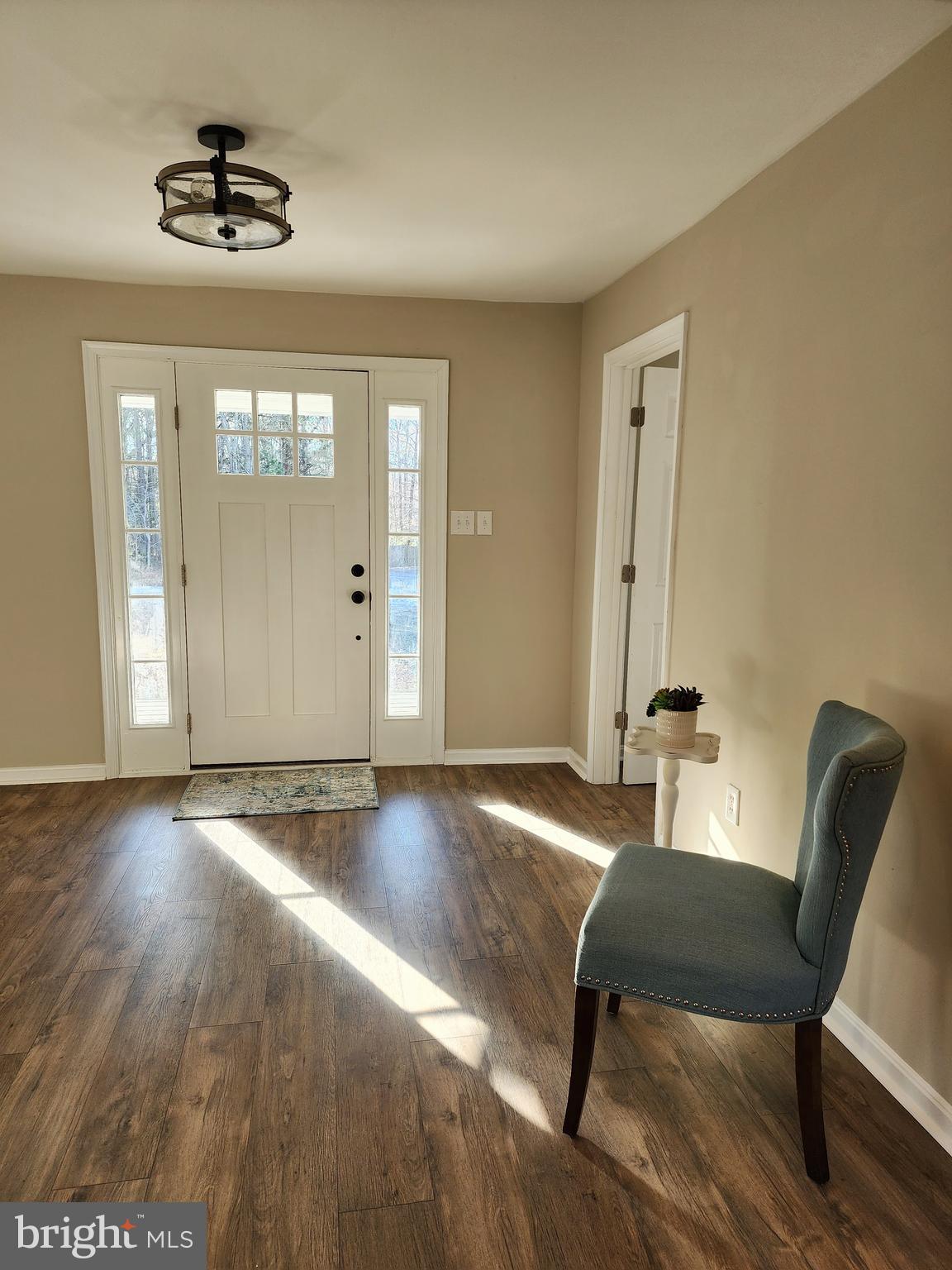 475 Bafford Road Lusby, MD 20657 - Photo 8 of 21 a view of a livingroom with furniture and wooden floor
