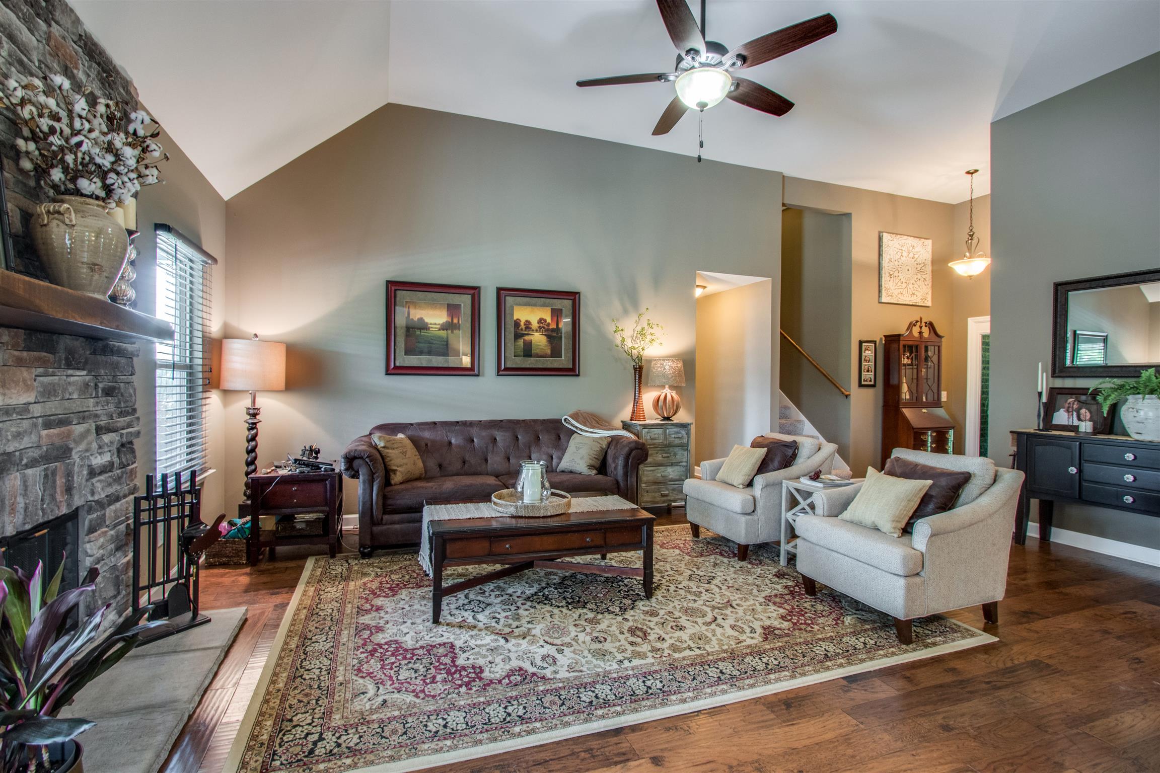 719 Sugar Flat Road Lebanon, TN 37087 - Photo 5 of 30 a living room with furniture and a fireplace
