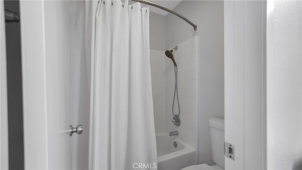 250 Chaumont Circle Lake Forest, CA 92610 - Photo 14 of 28 a bathroom with a shower