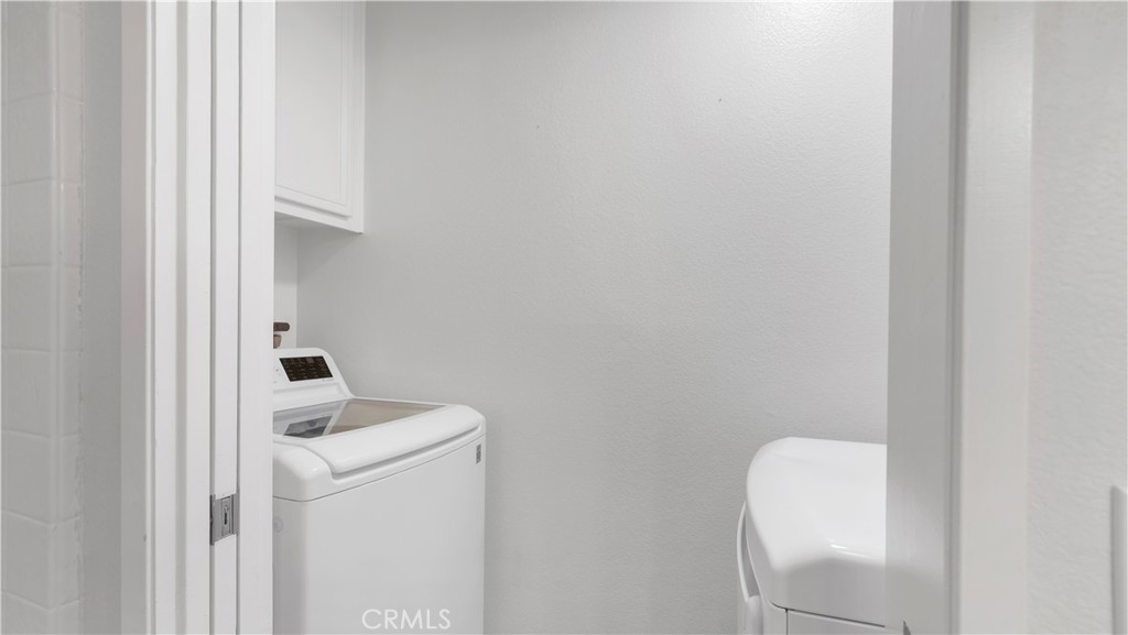 250 Chaumont Circle Lake Forest, CA 92610 - Photo 18 of 28 a utility room with dryer and washer