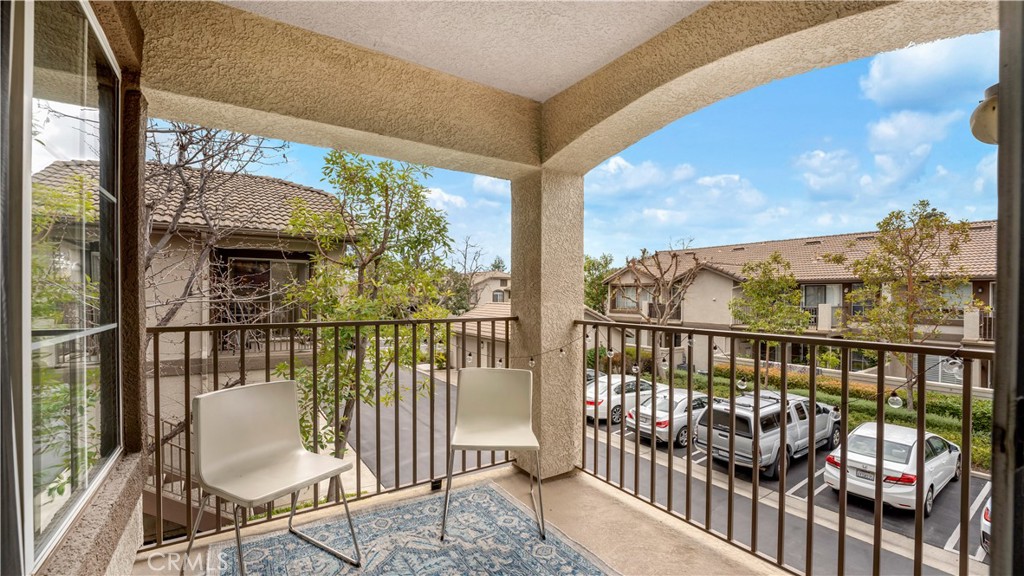 250 Chaumont Circle Lake Forest, CA 92610 - Photo 19 of 28 a view of a balcony with chairs