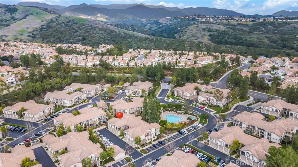 250 Chaumont Circle Lake Forest, CA 92610 - Photo 25 of 28 an aerial view of lake residential house with outdoor space