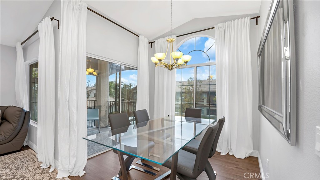 250 Chaumont Circle Lake Forest, CA 92610 - Photo 9 of 28 a dining room with furniture and chandelier