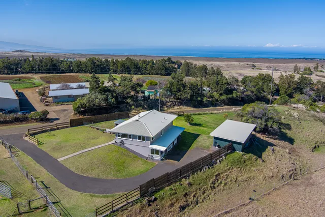 an aerial view of a pool patio swimming pool and outdoor seating