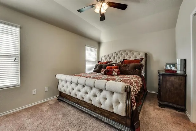 a bedroom with a bed and a closet