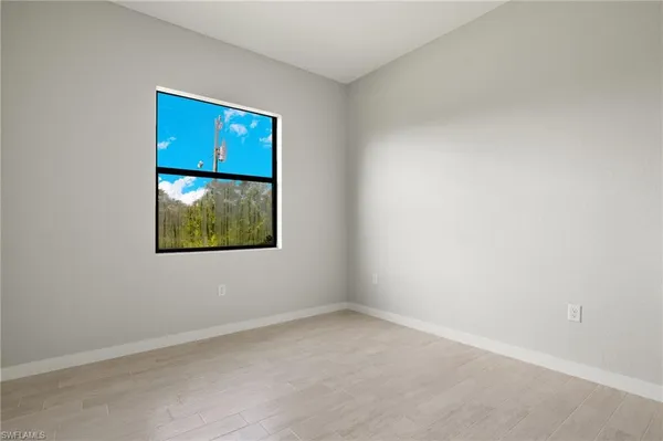 an empty room with window