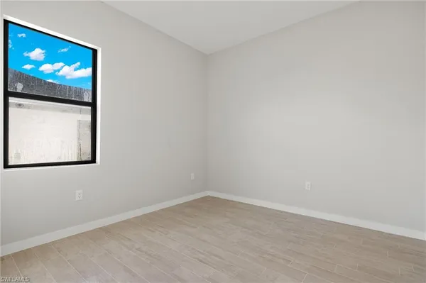 a view of a room with a flat screen tv