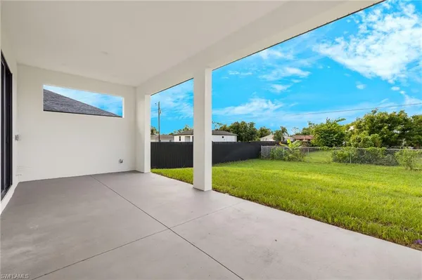 a view of a backyard with green space