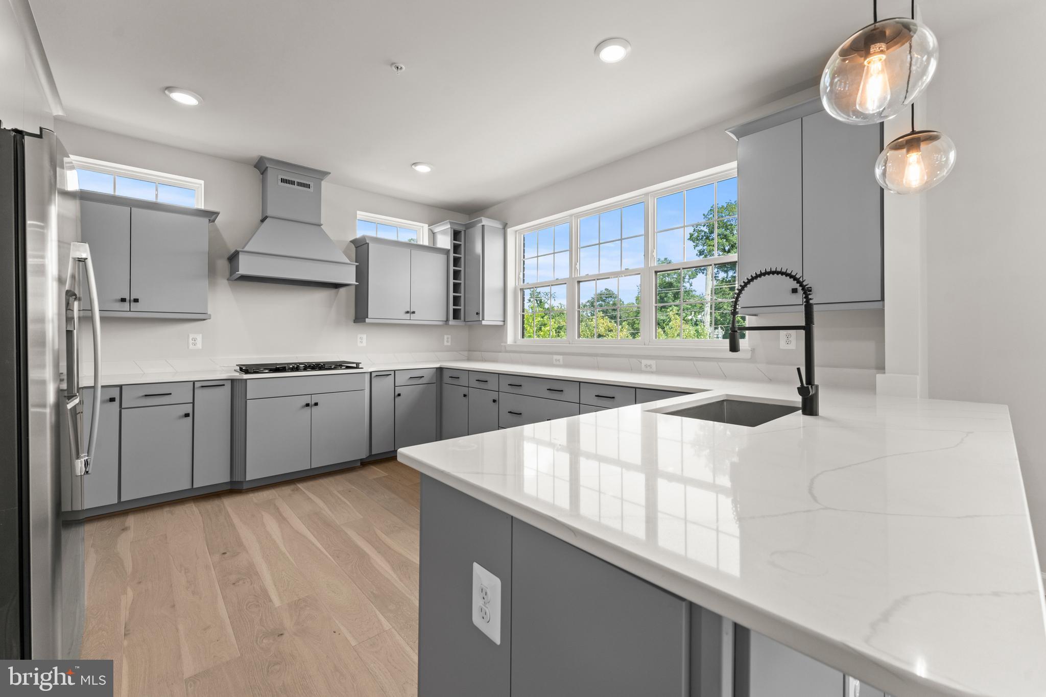 623 Trimaran Way Oxon Hill, MD 20745 - Photo 13 of 45 a kitchen with stainless steel appliances a sink window and cabinets