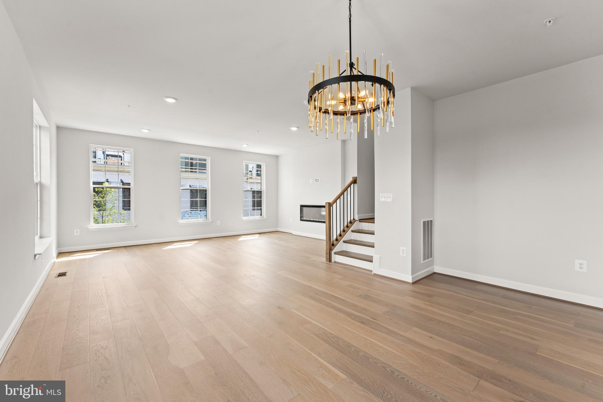 623 Trimaran Way Oxon Hill, MD 20745 - Photo 18 of 45 a view of an empty room with a window and wooden floor