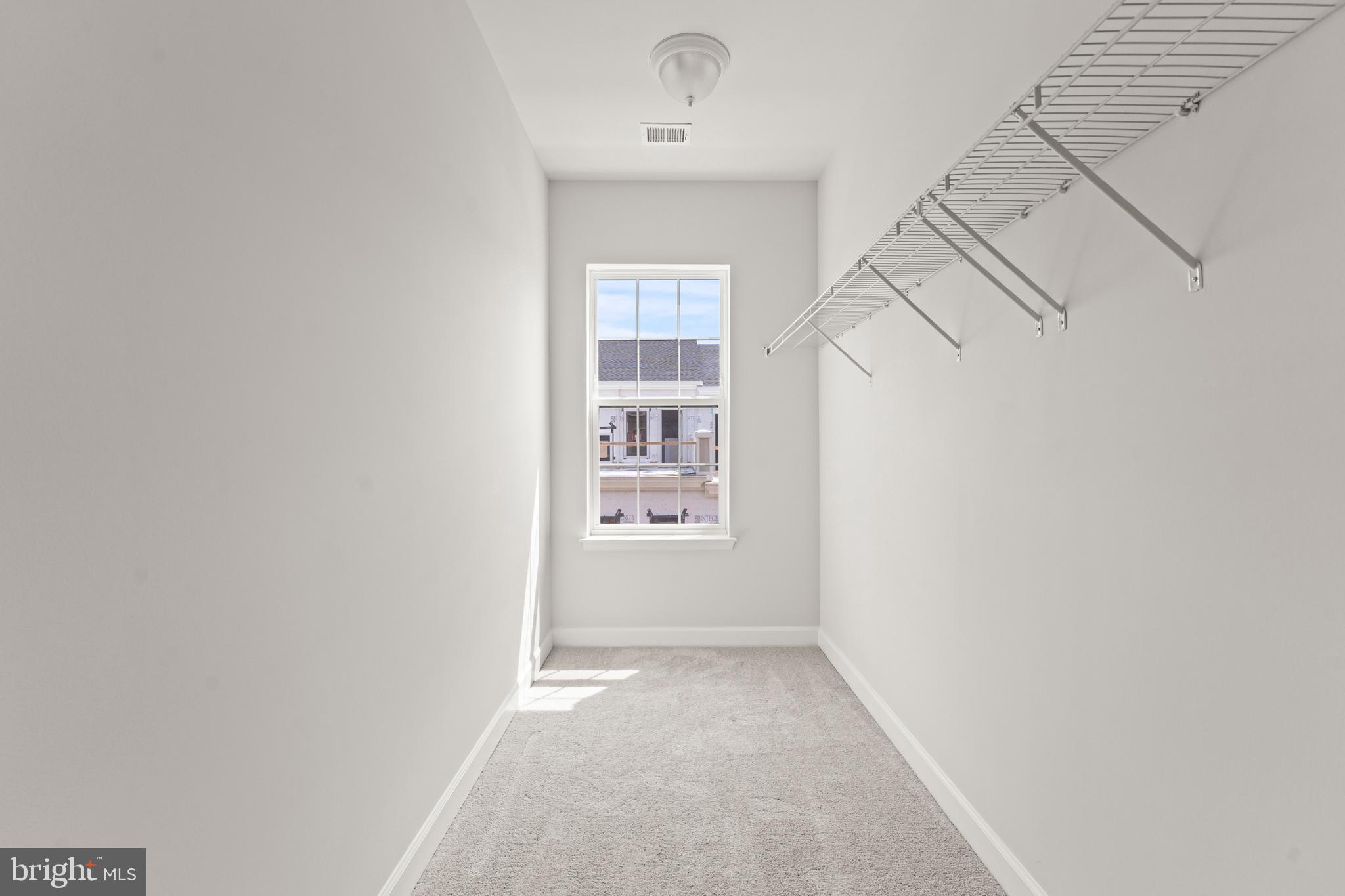 623 Trimaran Way Oxon Hill, MD 20745 - Photo 24 of 45 a view of an empty room with a window