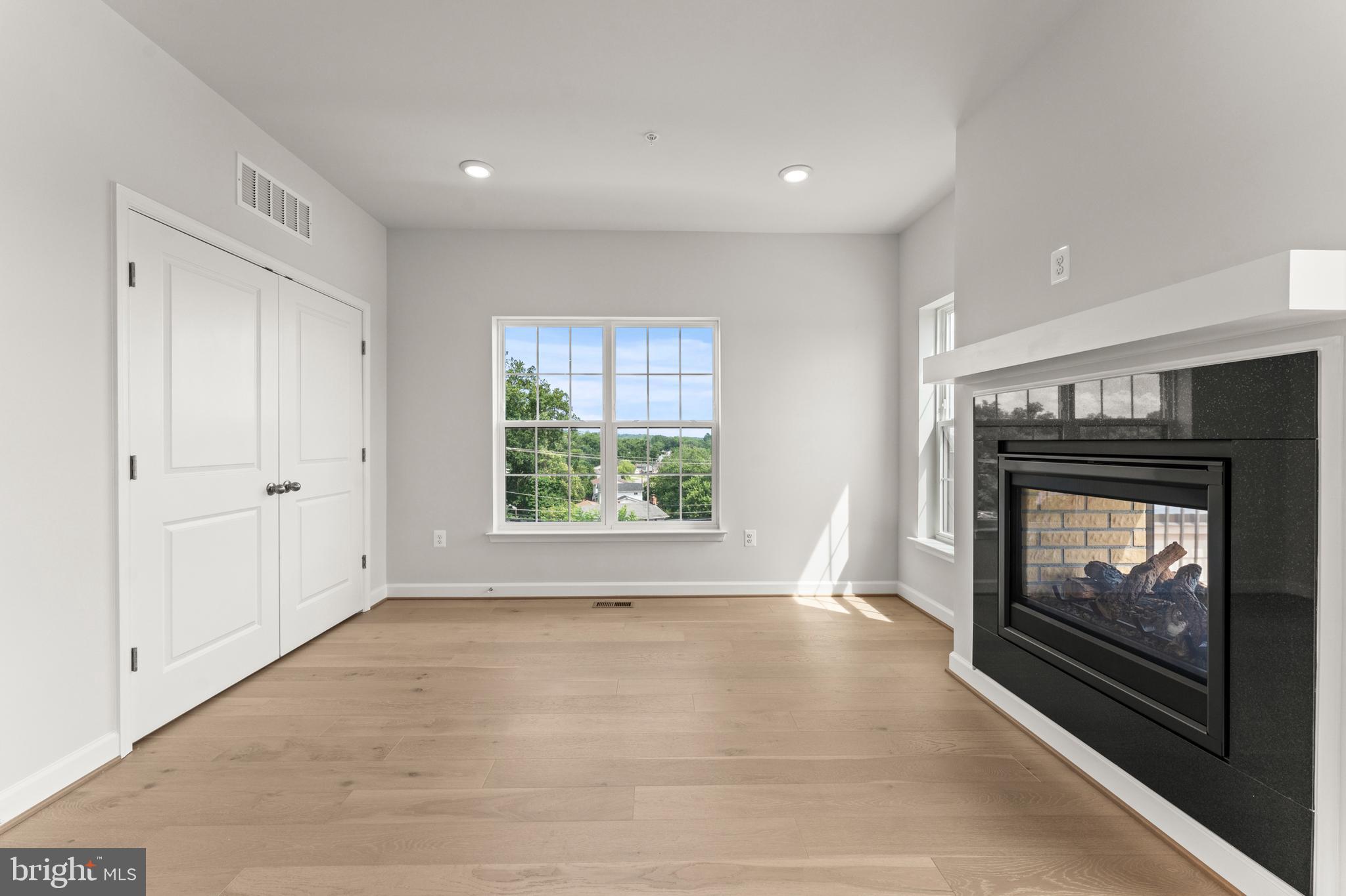 623 Trimaran Way Oxon Hill, MD 20745 - Photo 40 of 45 a view of an empty room with a fireplace and a window