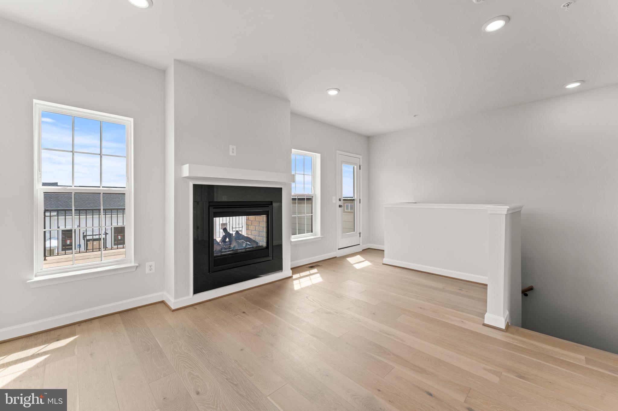 623 Trimaran Way Oxon Hill, MD 20745 - Photo 41 of 45 a view of an empty room with a fireplace and a window