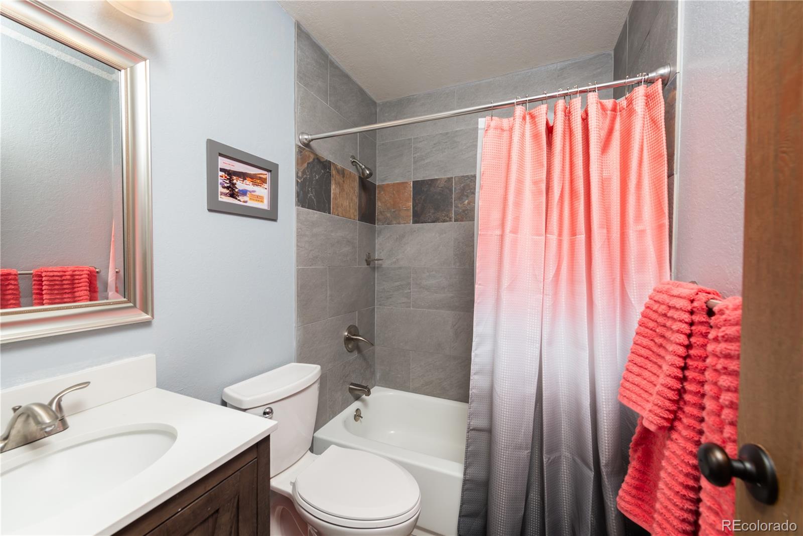 317 County Road 832, Unit 2412 Fraser, CO 80442 - Photo 12 of 17 a bathroom with a sink toilet and shower