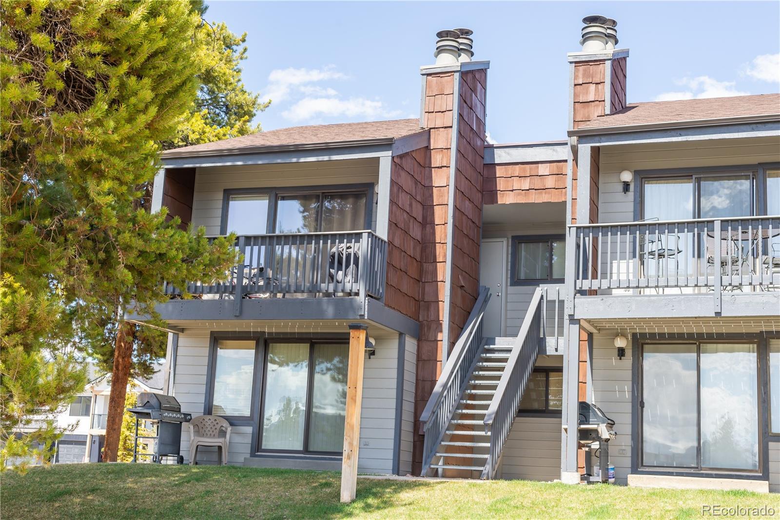 317 County Road 832, Unit 2412 Fraser, CO 80442 - Photo 15 of 17 a view of a house with a swimming pool
