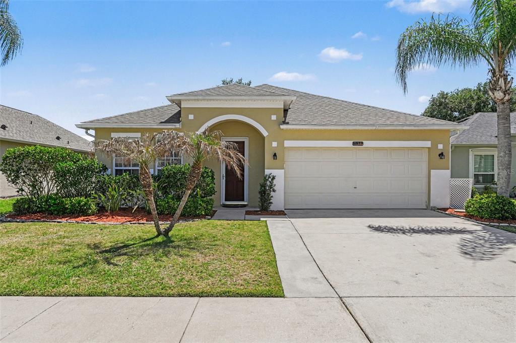 531 Cressa Circle Cocoa, FL 32926 - Photo 1 of 16 a front view of a house with a yard