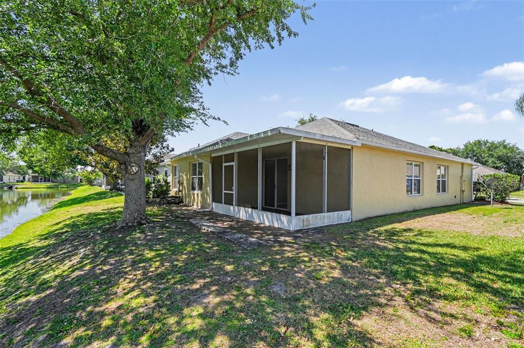 531 Cressa Circle Cocoa, FL 32926 - Photo 16 of 16 a view of a house with a yard