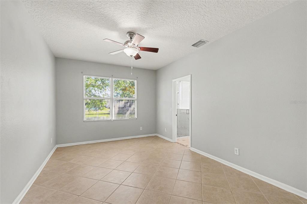 531 Cressa Circle Cocoa, FL 32926 - Photo 8 of 16 a view of an empty room with a window