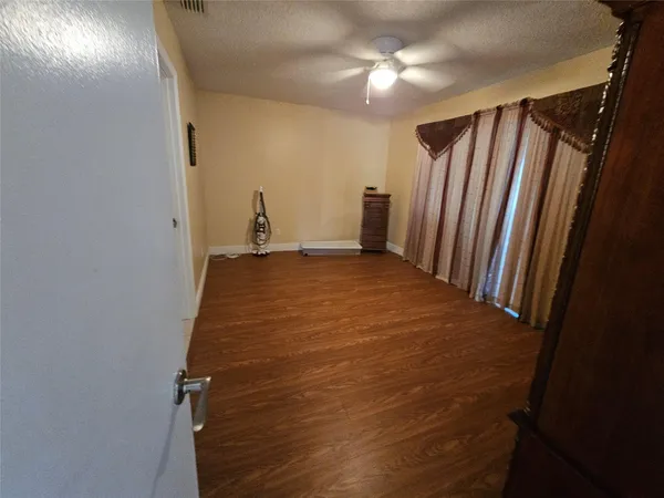 a view of a room with a fireplace