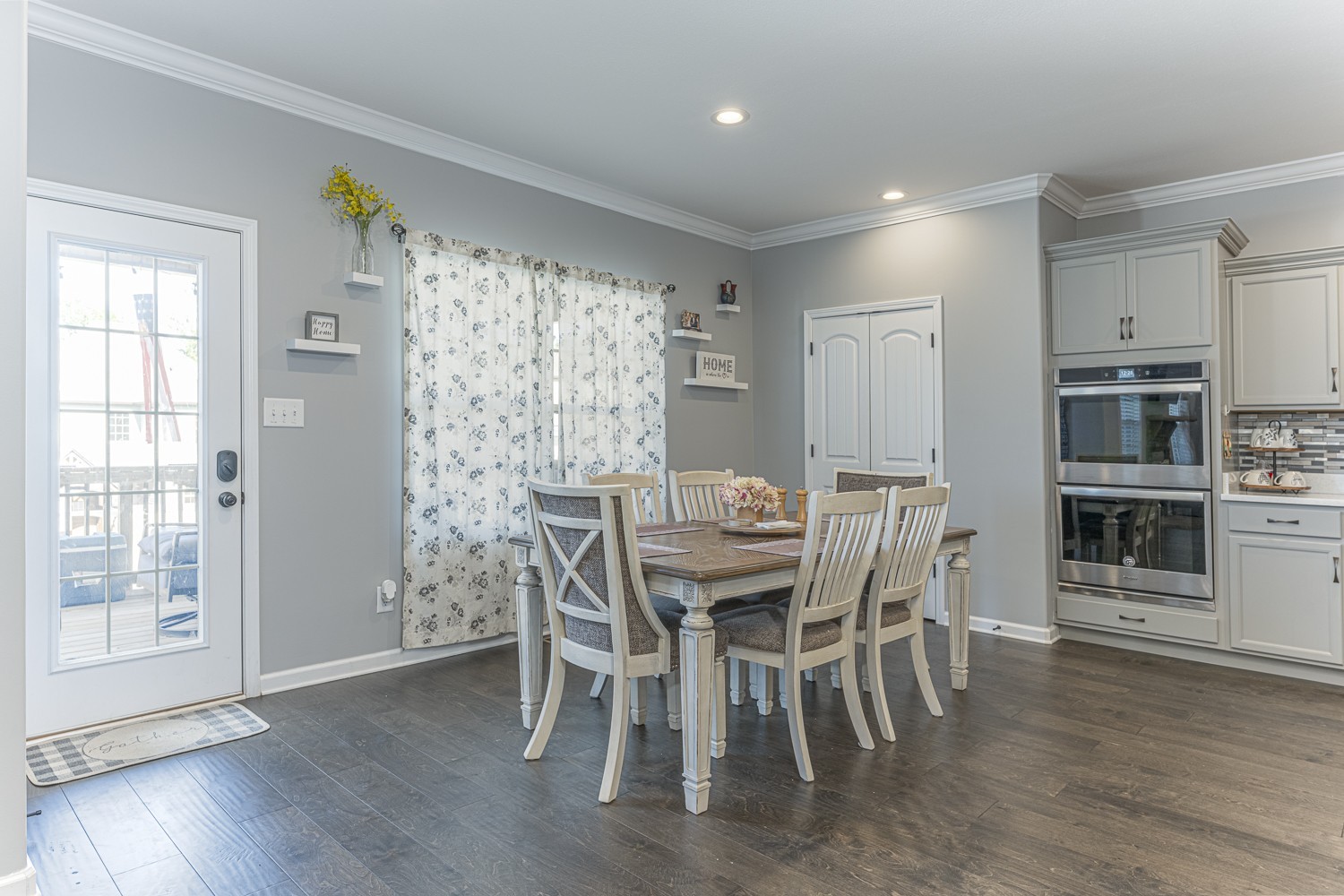 305 Winter Terrace Lane Clarksville, TN 37040 - Photo 16 of 38 a dining room with furniture and wooden floor