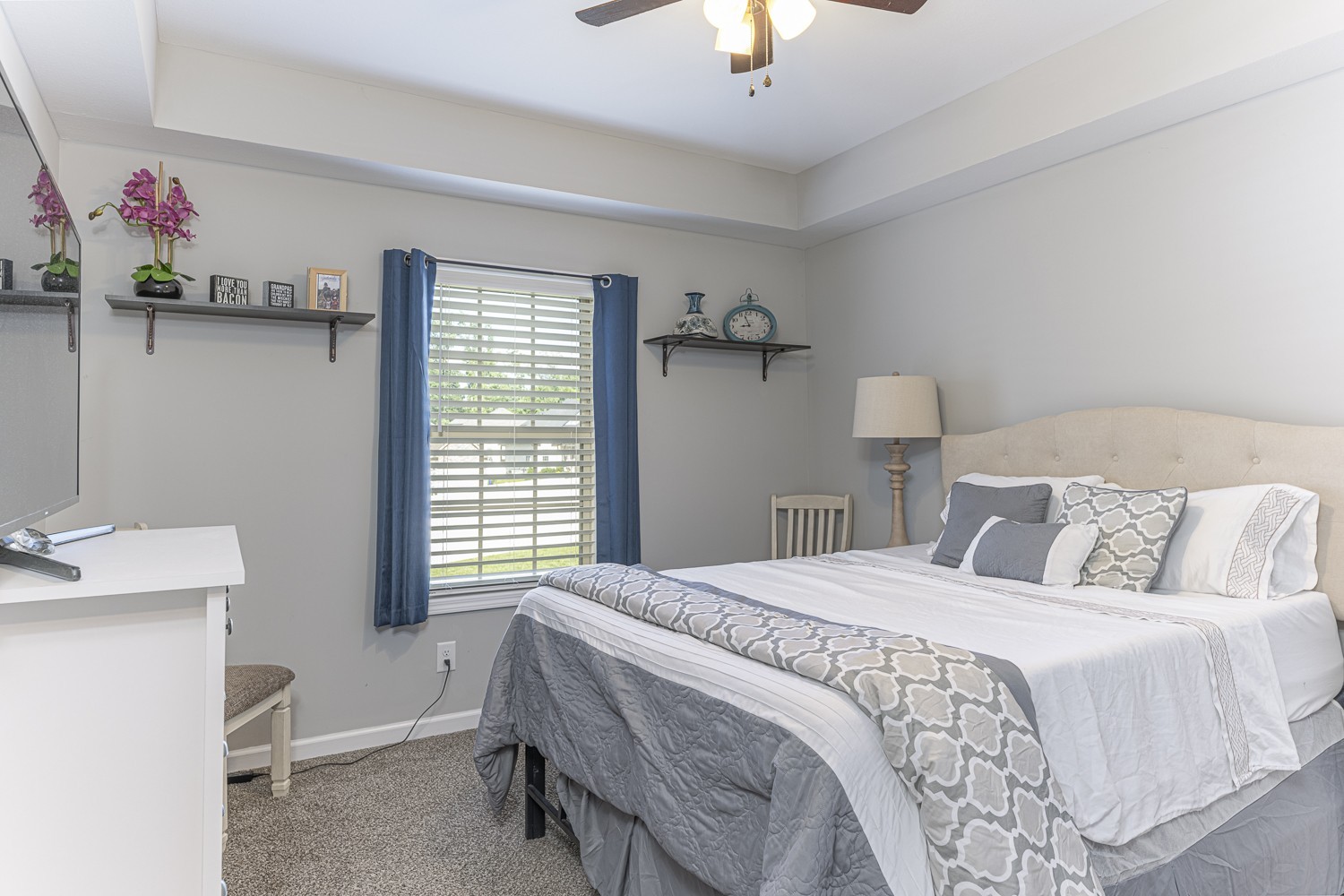 305 Winter Terrace Lane Clarksville, TN 37040 - Photo 20 of 38 a bedroom with a bed and a chandelier