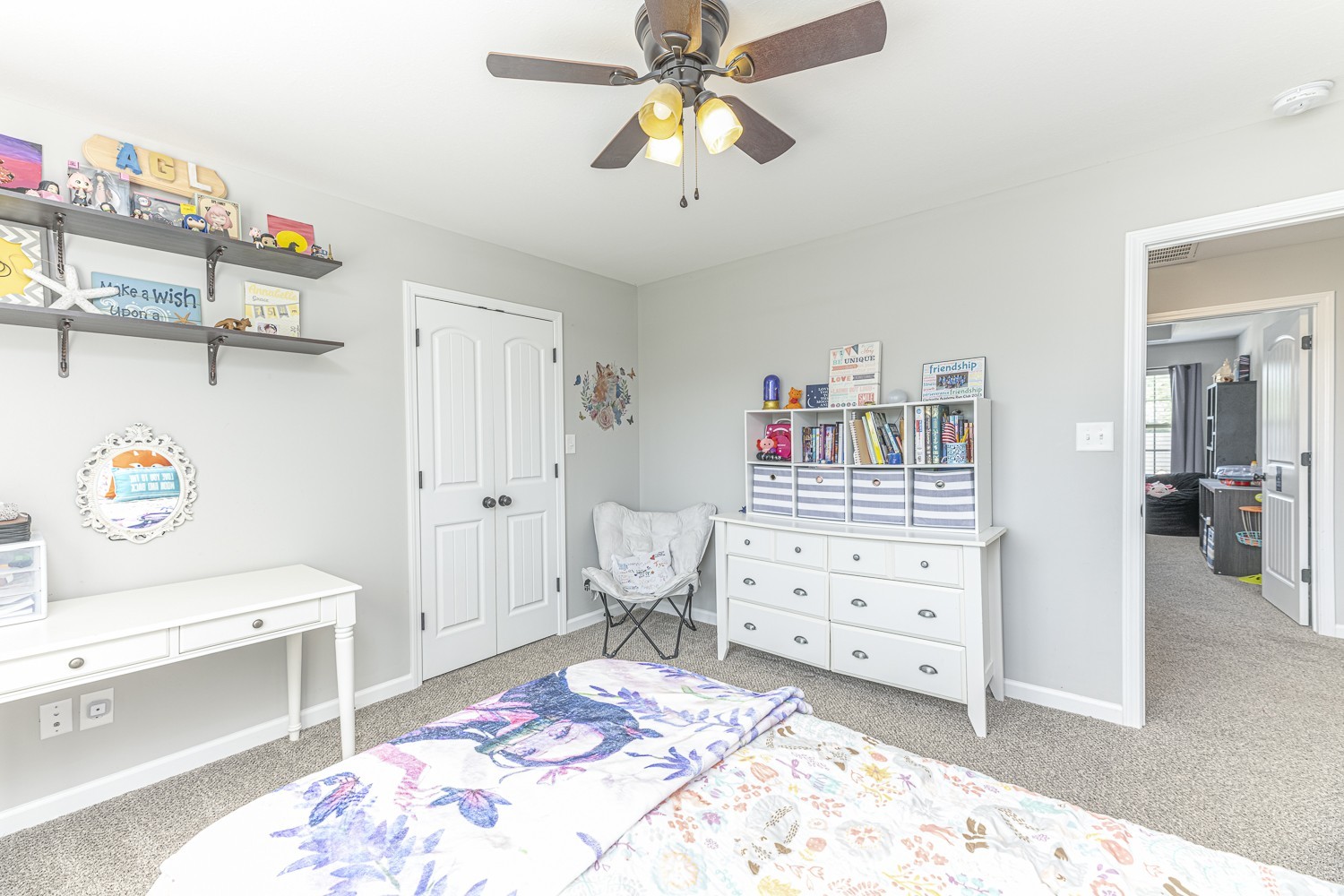 305 Winter Terrace Lane Clarksville, TN 37040 - Photo 21 of 38 a bedroom with a bed and a chandelier