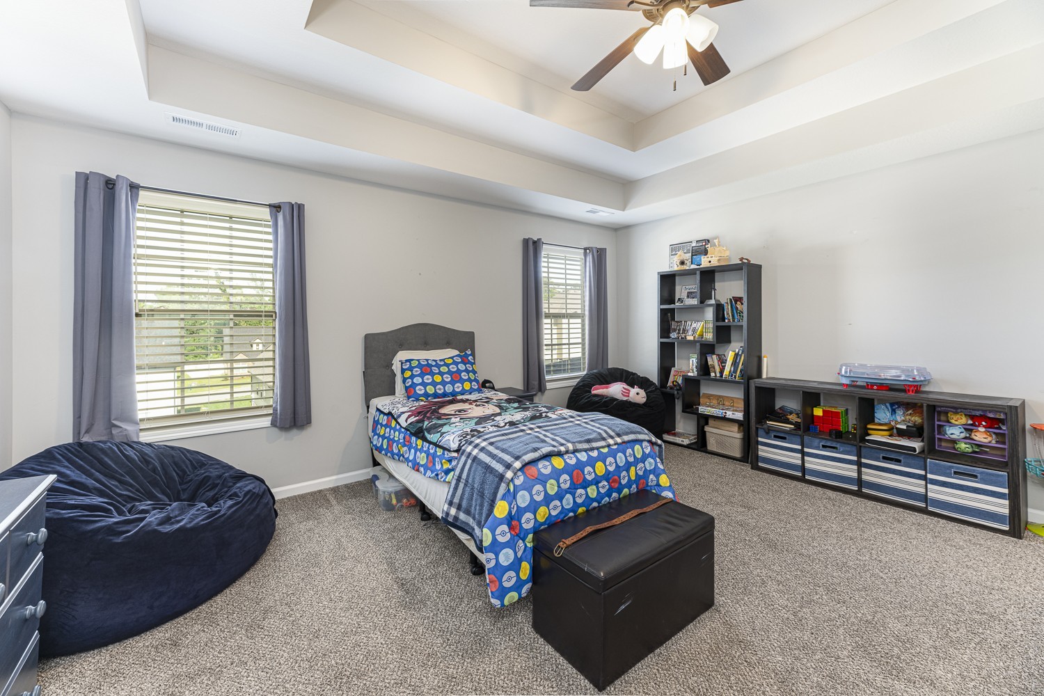 305 Winter Terrace Lane Clarksville, TN 37040 - Photo 24 of 38 a bedroom with a bed and a chandelier