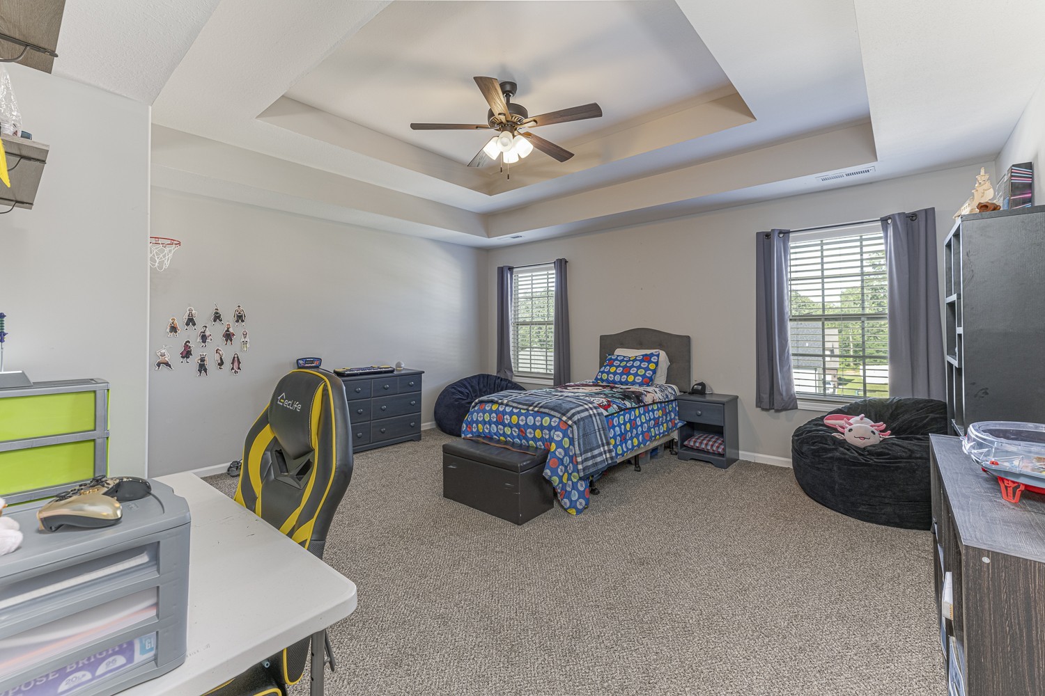 305 Winter Terrace Lane Clarksville, TN 37040 - Photo 26 of 38 a bedroom with a bed and a chandelier
