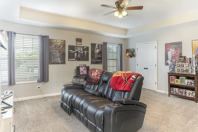 a living room with furniture and window