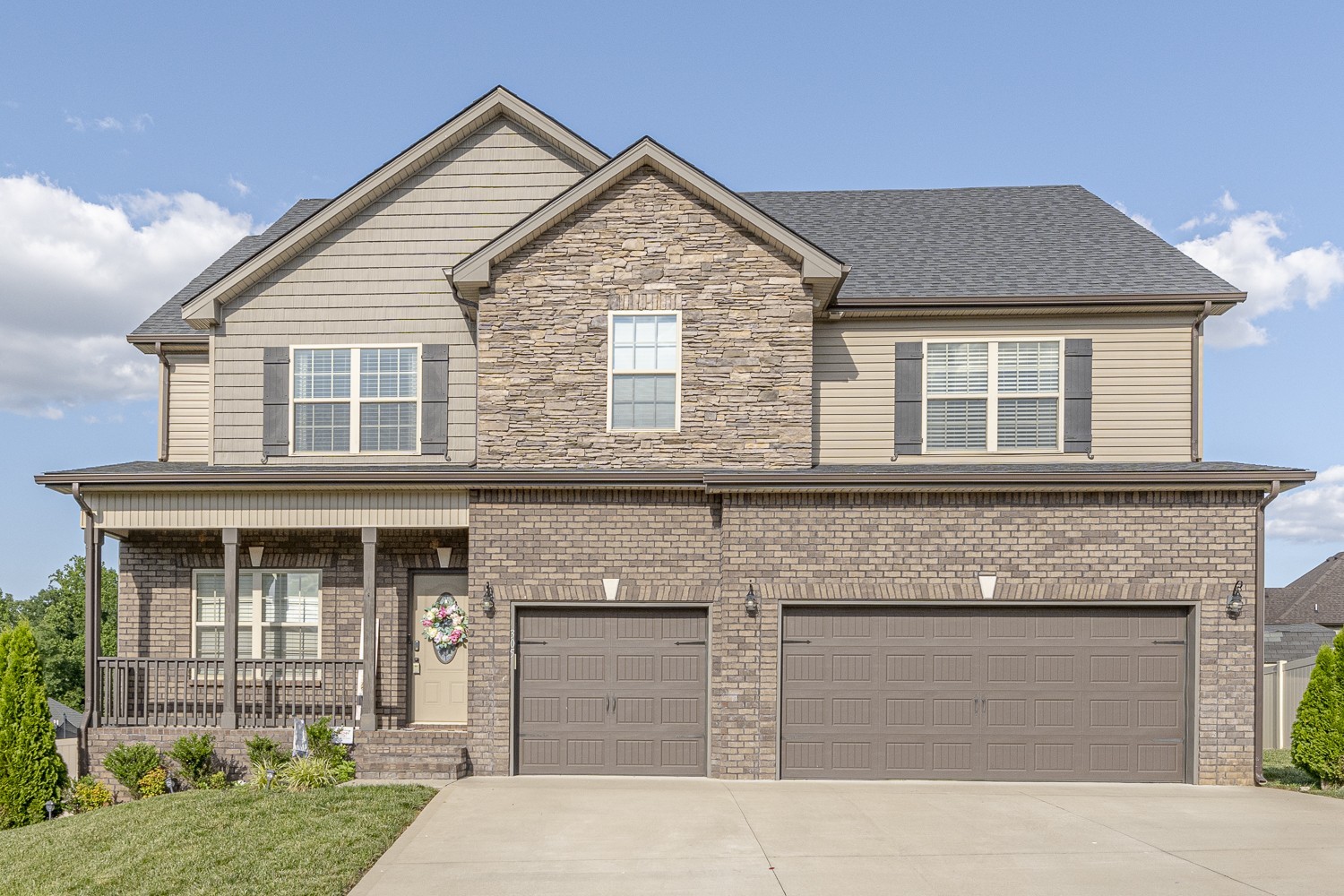 305 Winter Terrace Lane Clarksville, TN 37040 - Photo 3 of 38 a front view of a house with garden