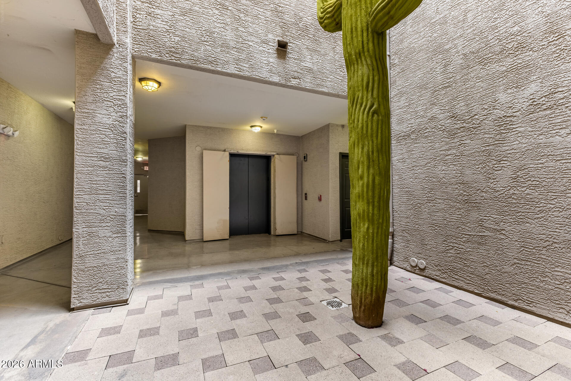 435 West Rio Salado Parkway, Unit 305 Tempe, AZ 85281 - Photo 16 of 44 a view of a hallway with wooden walls