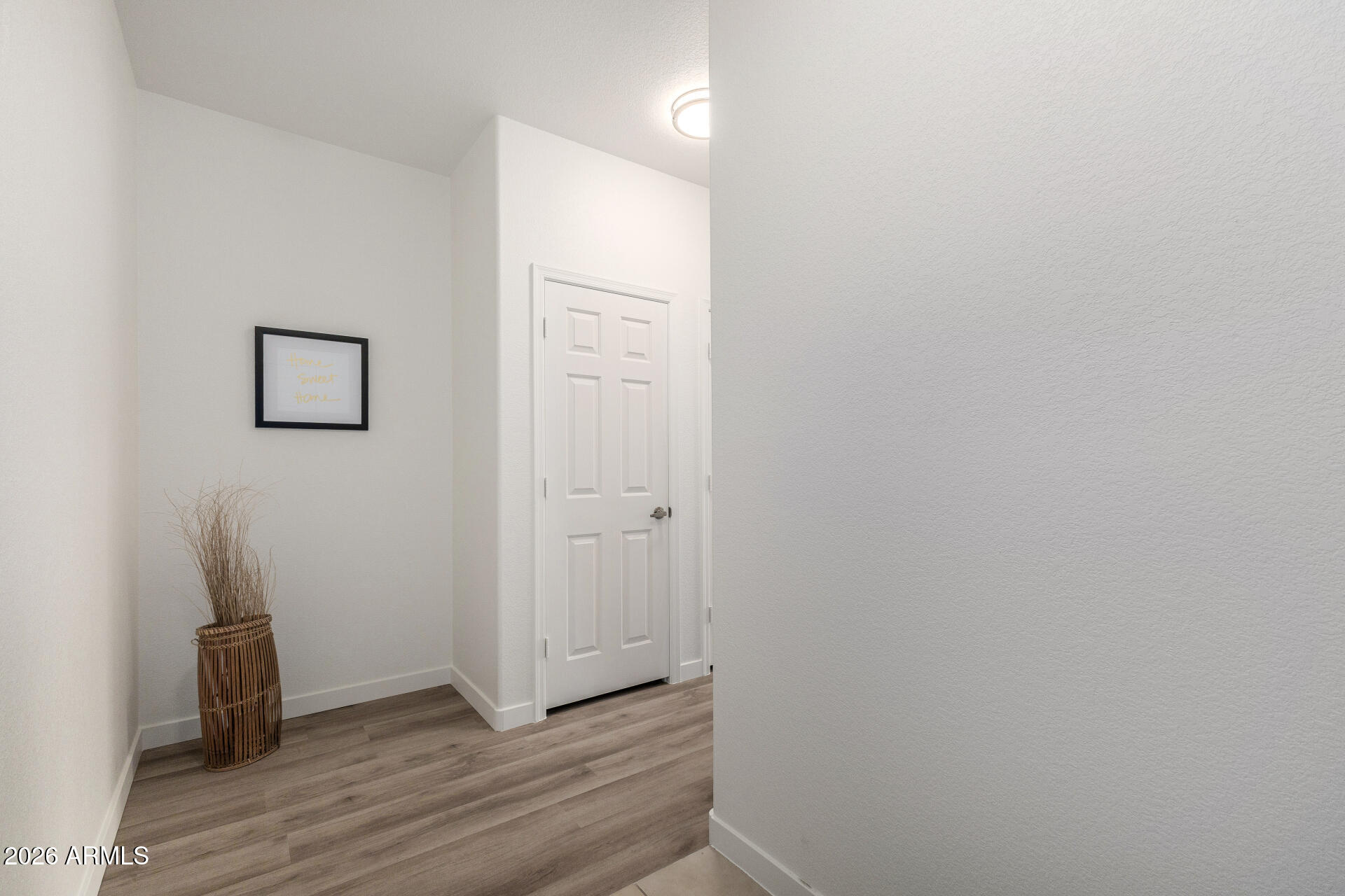 435 West Rio Salado Parkway, Unit 305 Tempe, AZ 85281 - Photo 24 of 44 a view of a hallway with wooden floor and closet