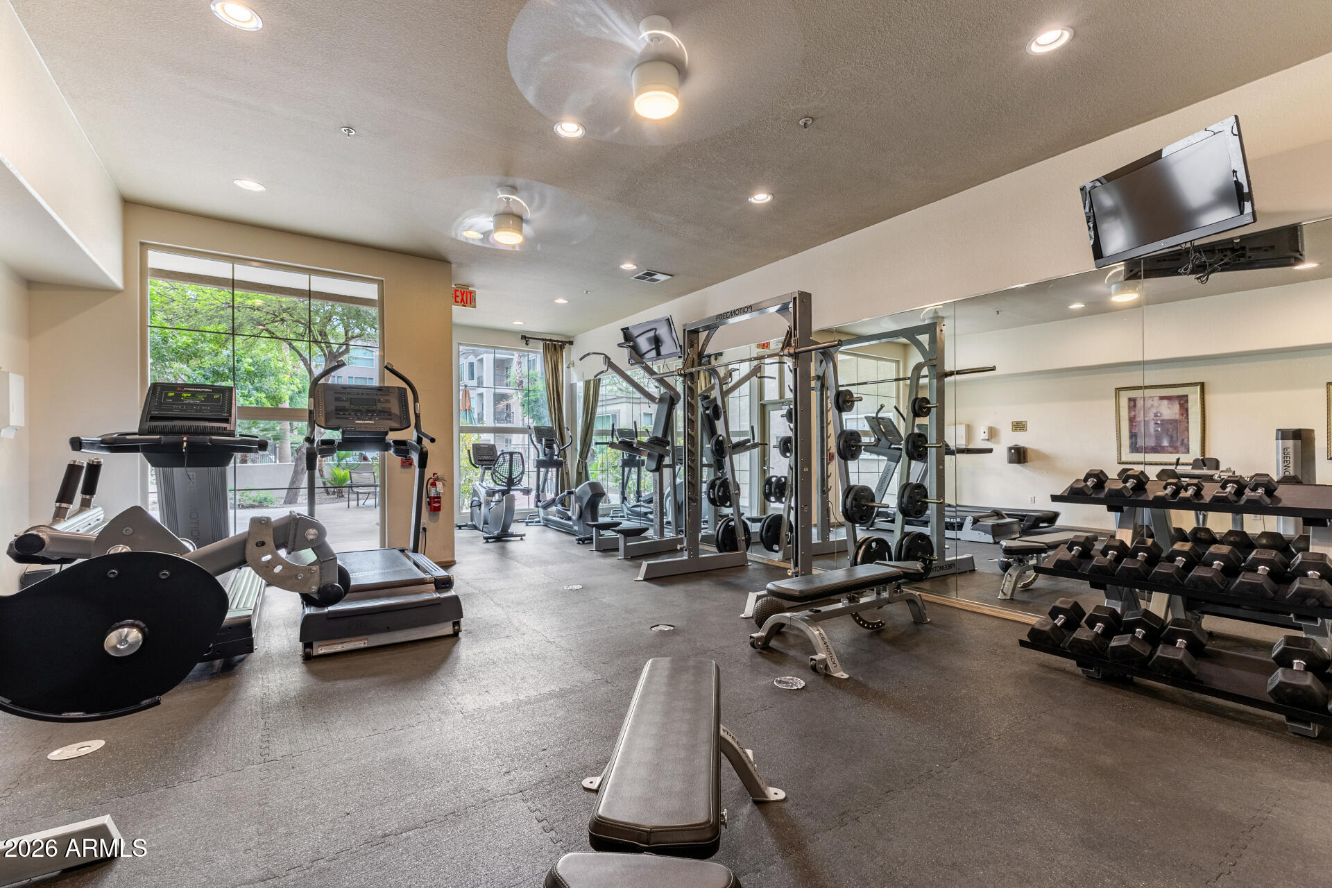 435 West Rio Salado Parkway, Unit 305 Tempe, AZ 85281 - Photo 29 of 44 a room with gym equipment and a large window