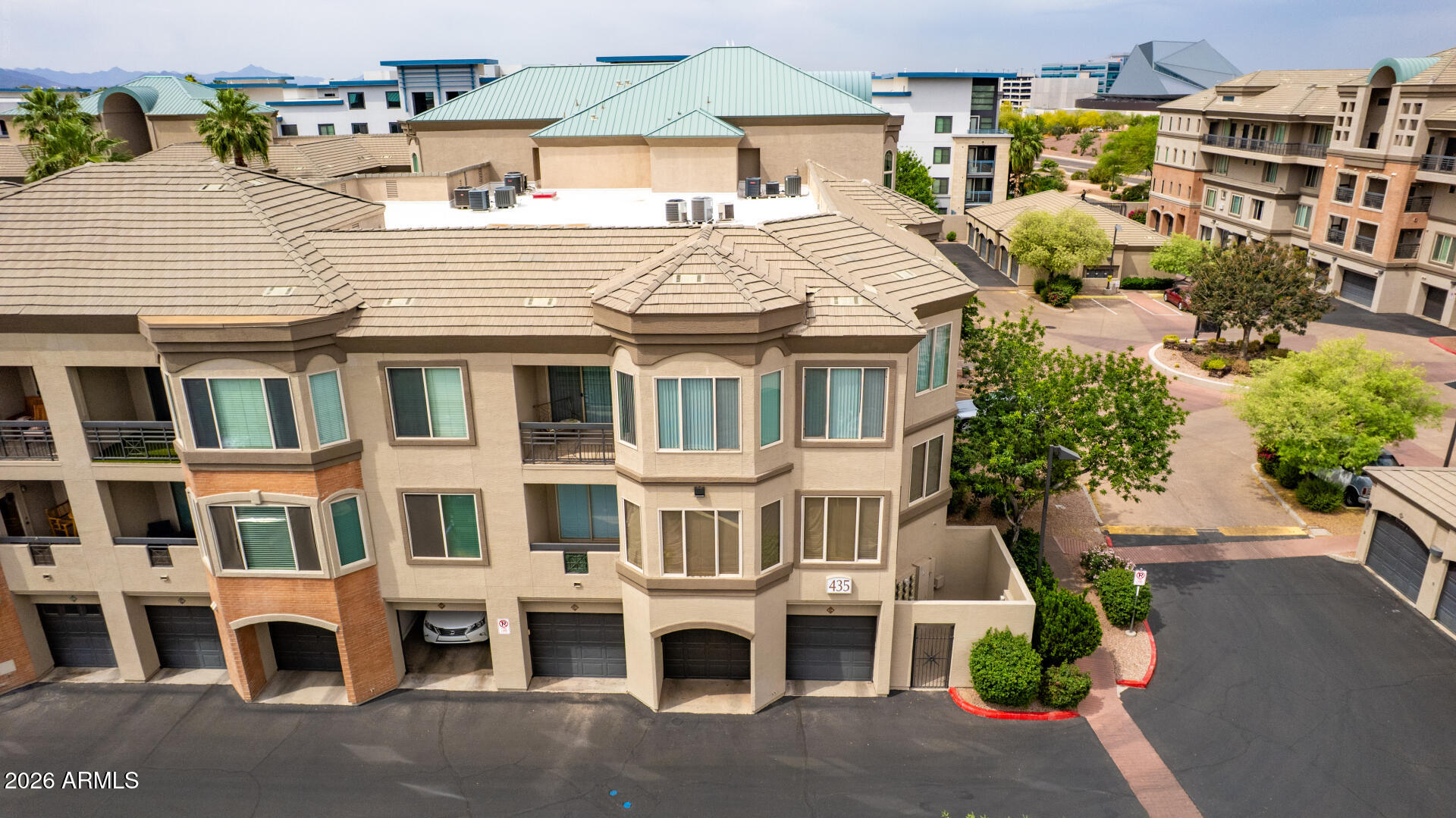 435 West Rio Salado Parkway, Unit 305 Tempe, AZ 85281 - Photo 35 of 44 a view of a white building among the street
