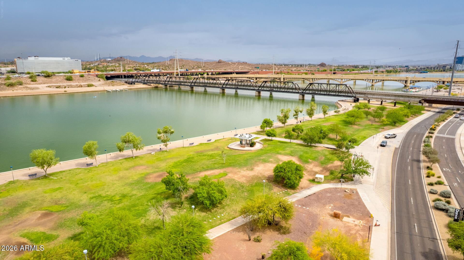 435 West Rio Salado Parkway, Unit 305 Tempe, AZ 85281 - Photo 38 of 44 a view of a lake with a building in the background