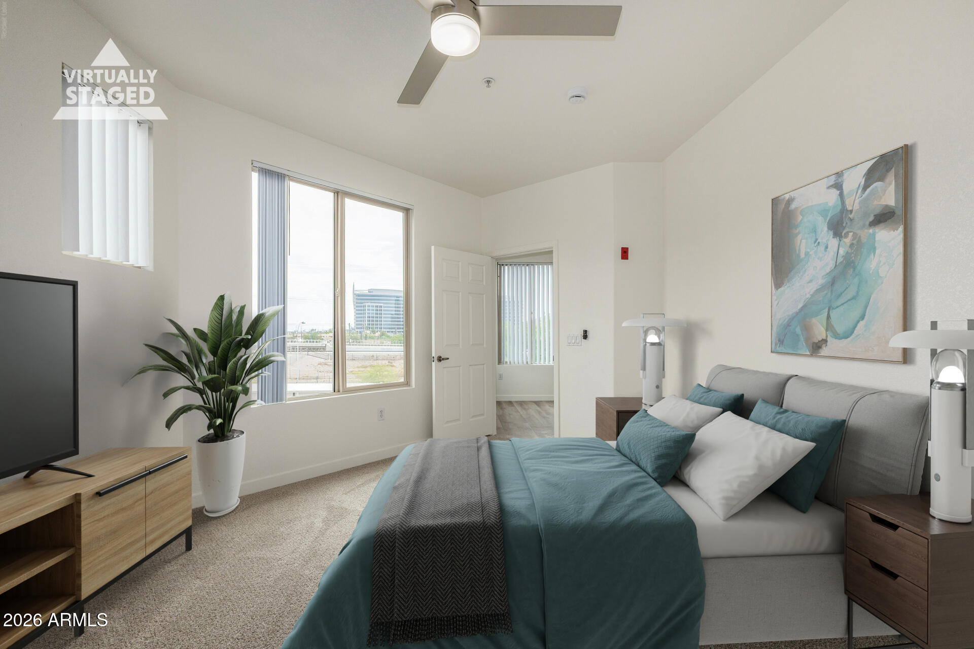 435 West Rio Salado Parkway, Unit 305 Tempe, AZ 85281 - Photo 5 of 44 a bedroom with a large bed and a window