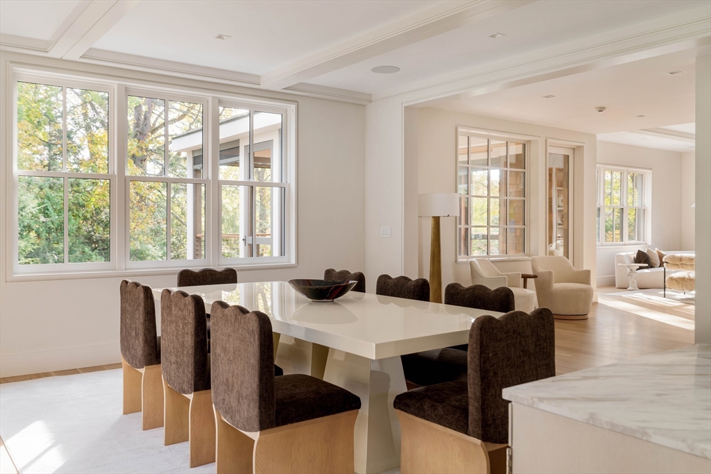 115 Windsor Road Newton, MA 02468 - Photo 17 of 42 a view of a dining room with furniture and windows