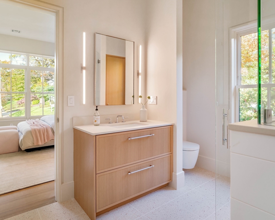 115 Windsor Road Newton, MA 02468 - Photo 31 of 42 a bathroom with a sink toilet and window