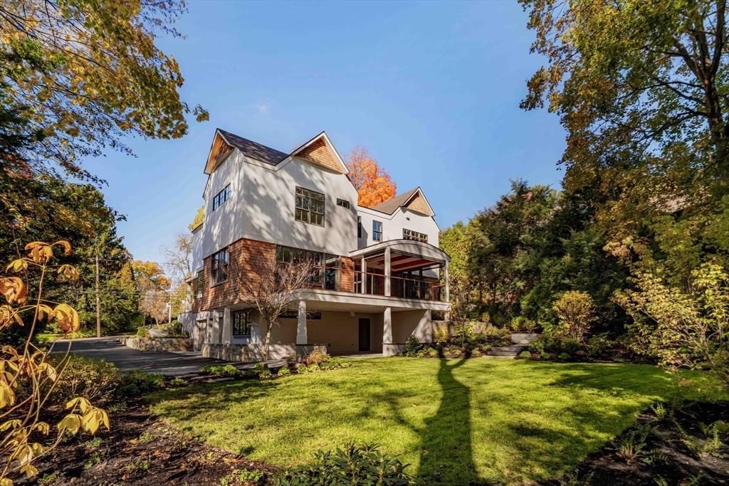 115 Windsor Road Newton, MA 02468 - Photo 40 of 42 a front view of a house with a yard