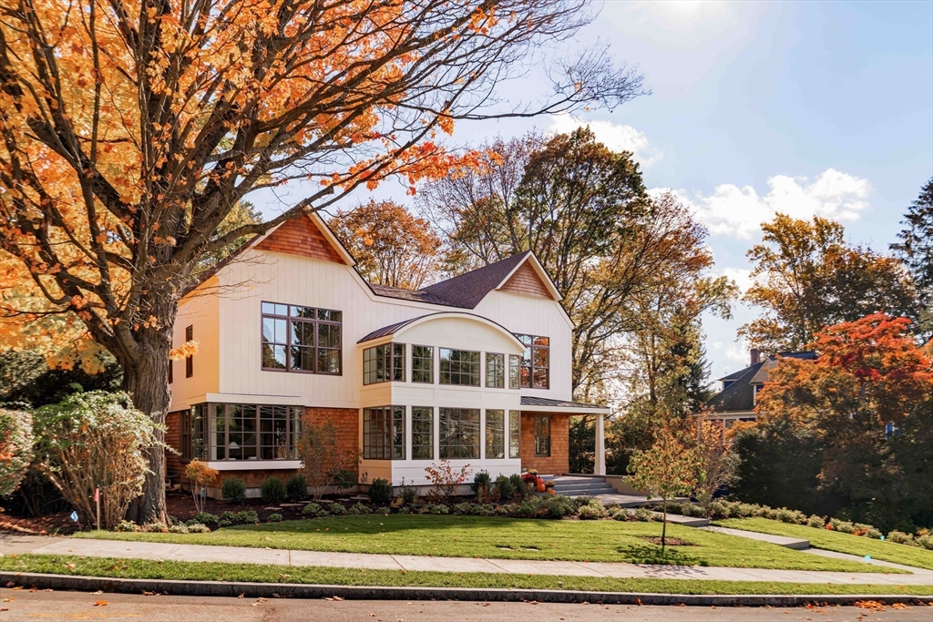 115 Windsor Road Newton, MA 02468 - Photo 42 of 42 a front view of a house with a garden and trees