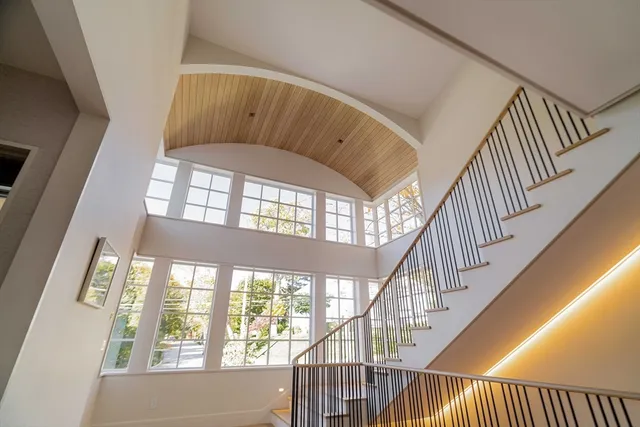 a view of staircase with large window