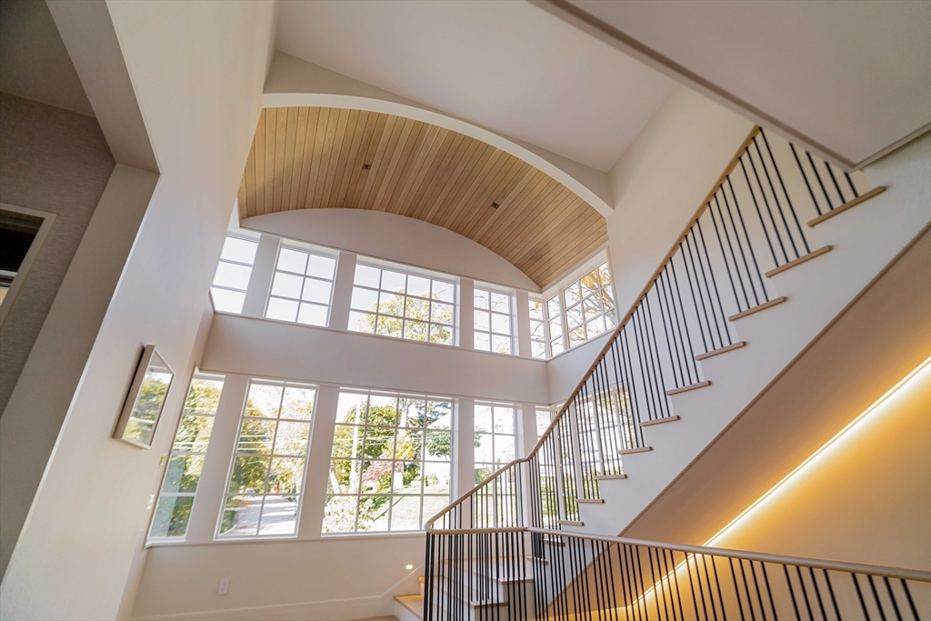115 Windsor Road Newton, MA 02468 - Photo 5 of 42 a view of staircase with large window